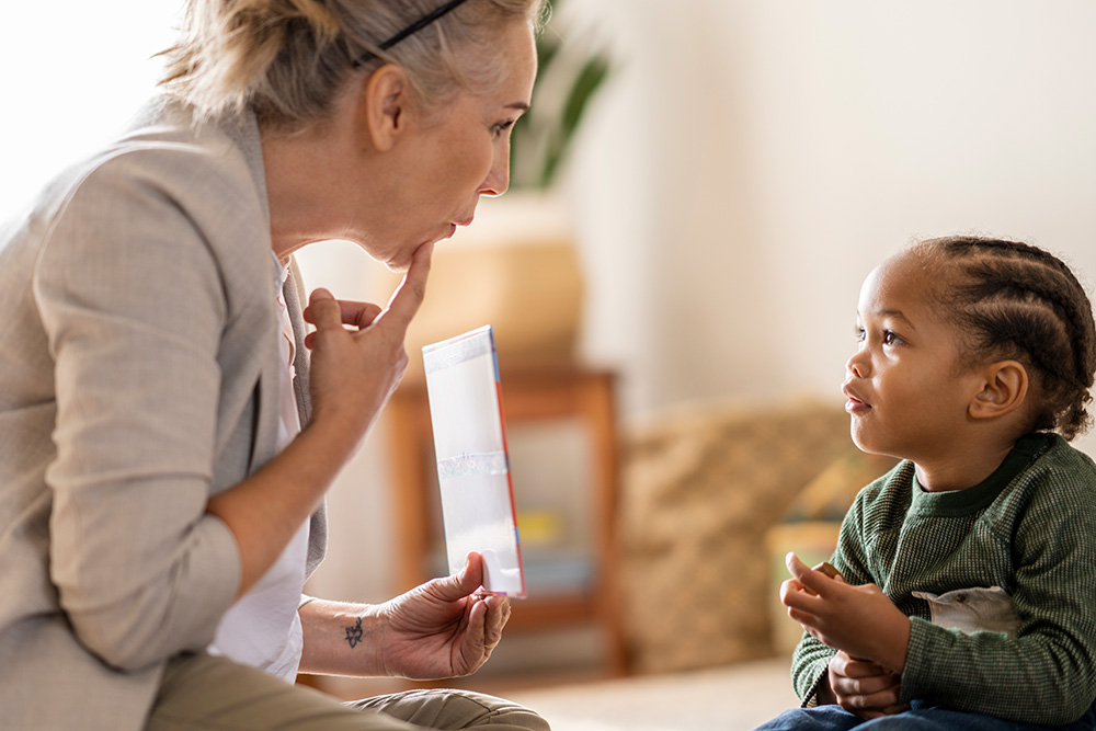 young boy receiving speech therapy from a Black River Memorial Hospital provider